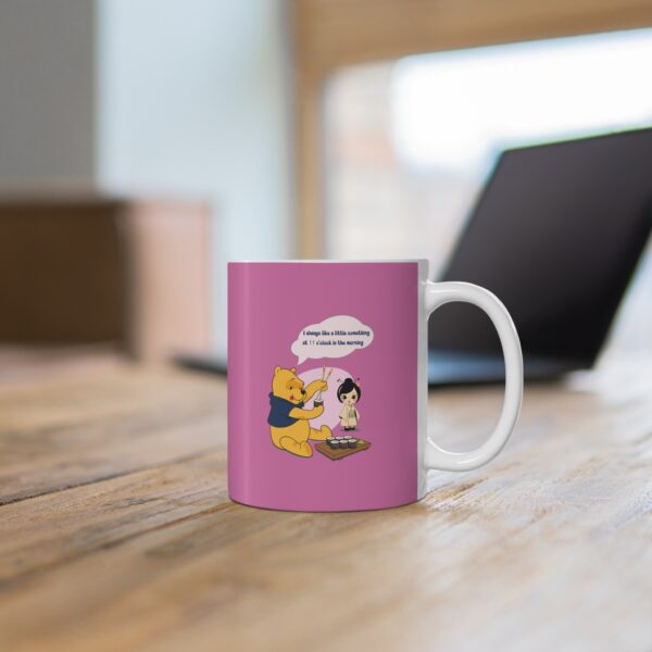 Winnie with a sushi Cup